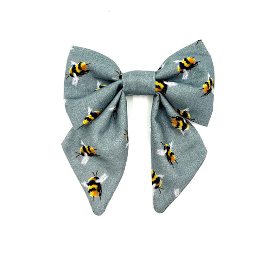 Beautiful handmade sailor bow in grey bee print fabric made to attach to a dog collar handmade in uk by barkley and fetch