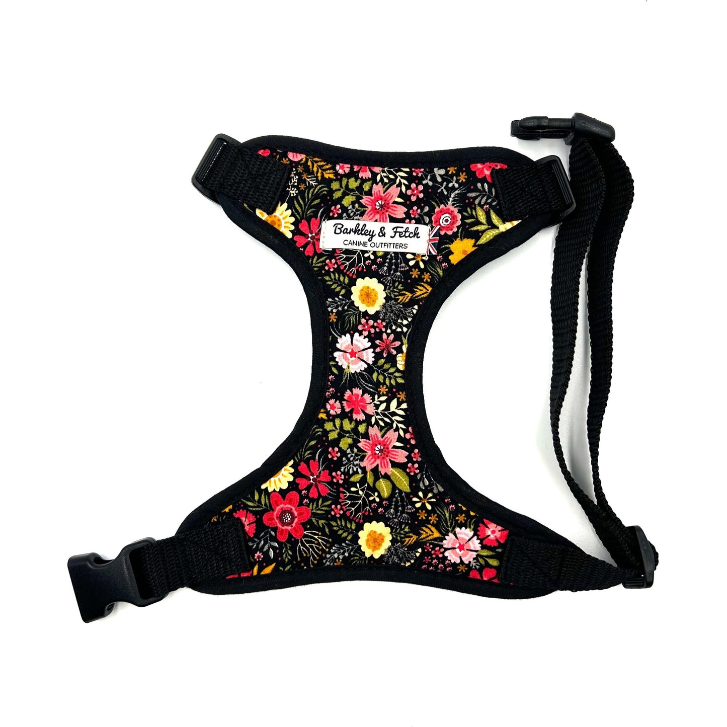 Floral-patterned dog harness with 'Barkley & Fetch' branding on a white background