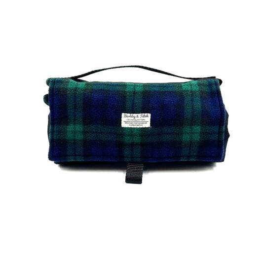 Beautiful handmade rolled up settle mat for dogs in blue and green tartan fleece fabric British handmade by Barkley and Fetch