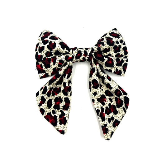 Luxury sailor bow in red leopard print corduroy fabric made to attach to a dog collar handmade in uk by barkley and fetch