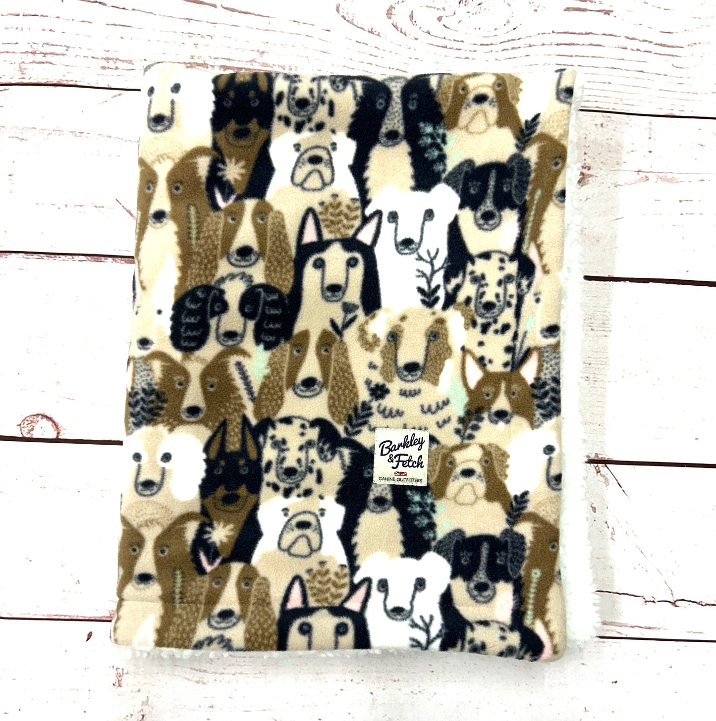 Cute and soft doggie print dog blanket with Sherpa fleece on the inside for extra warmth and comfort