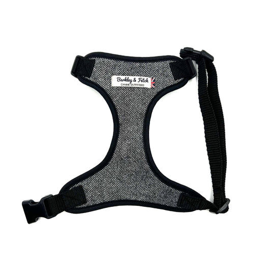 A grey herringbone pattern dog harness with adjustable straps and a heavy-duty d-ring, displayed on a white background. Handmade in the UK by Barkley and Fetch