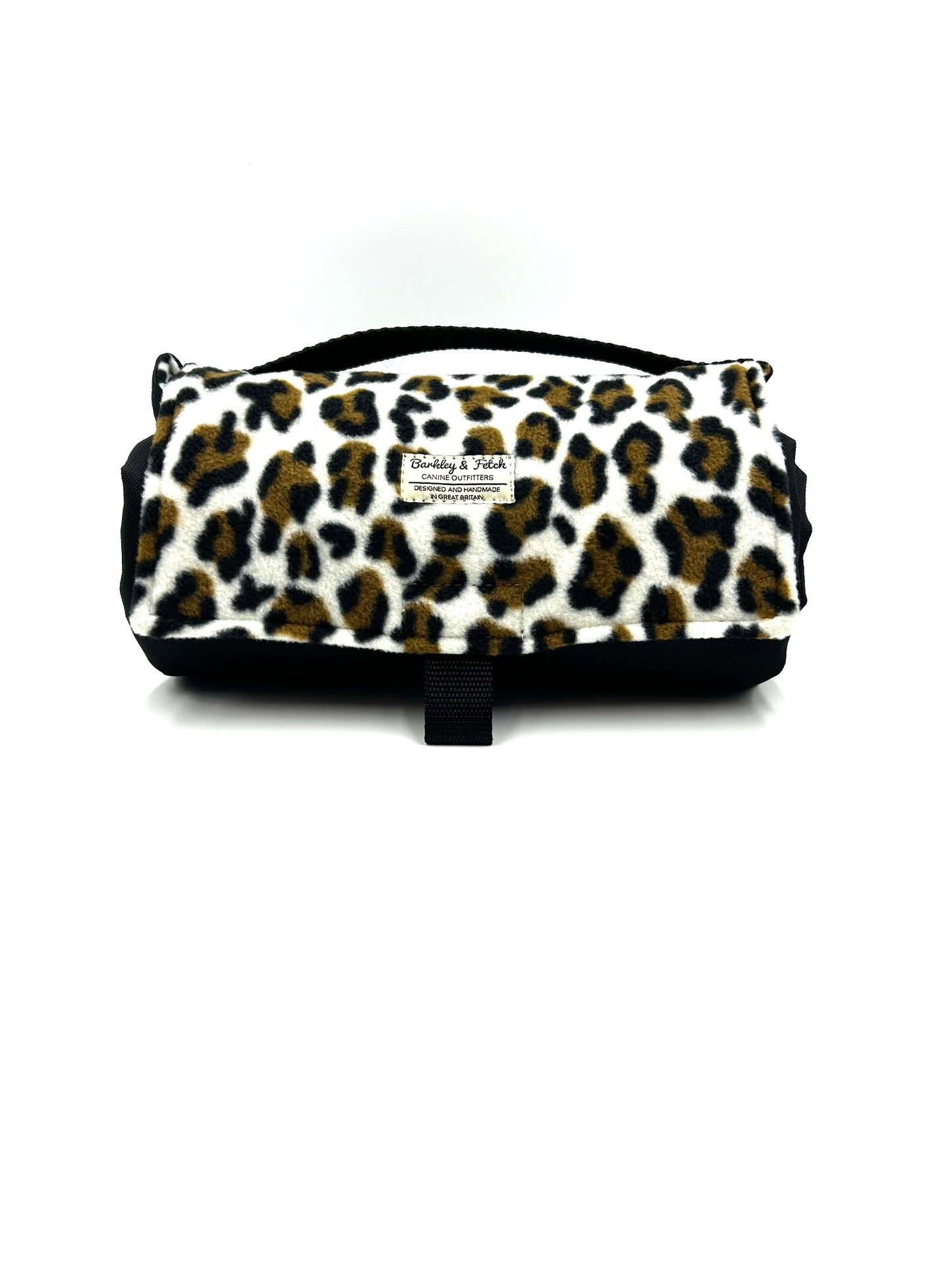 Large handmade rolled up settle mat for dogs in a leopard print fleece fabric