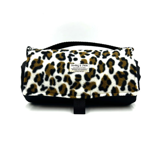 Large handmade rolled up settle mat for dogs in a leopard print fleece fabric  British handmade by Barkley and Fetch