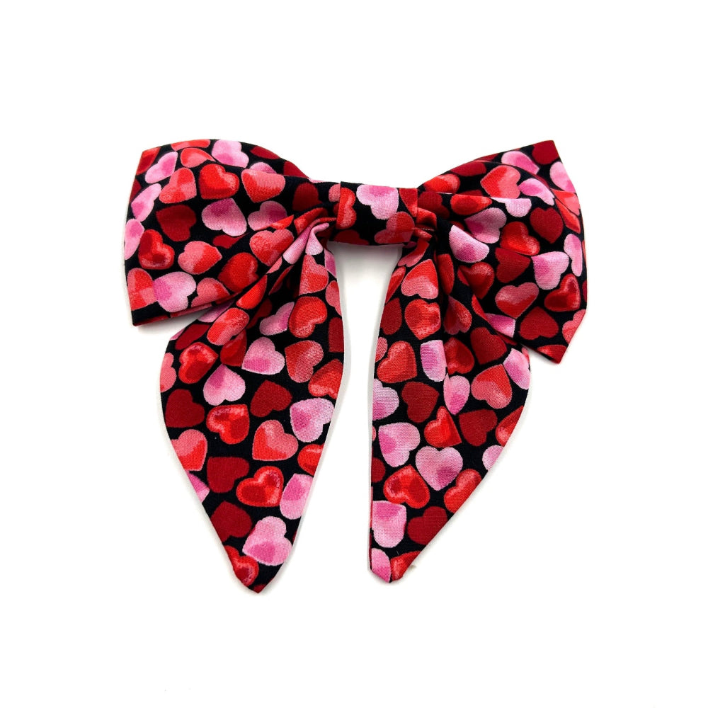 Cute handmade sailor bow in pink and red love heart print fabric made to attach to a dog collar by Barkley and Fetch UK