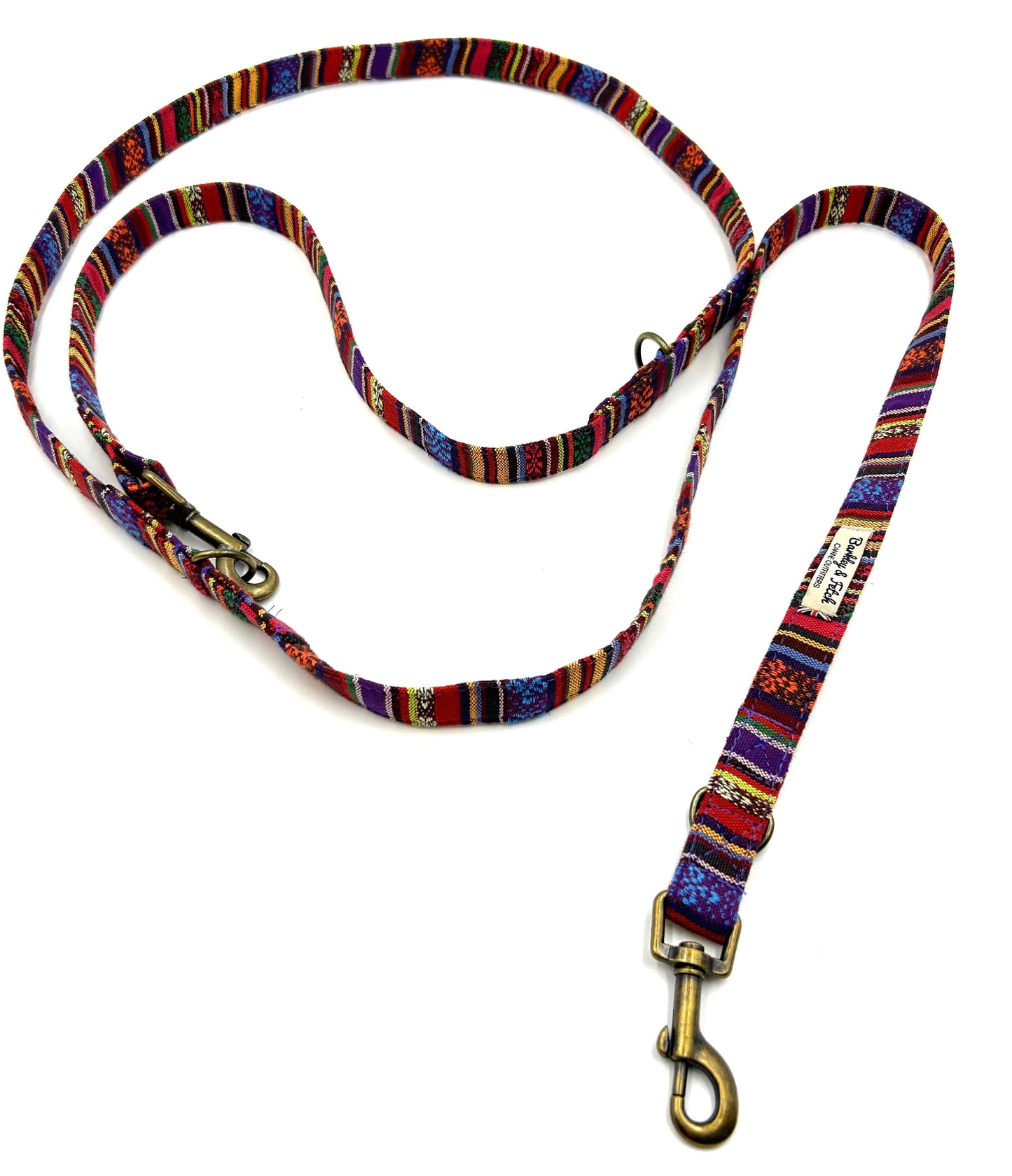 Colorful patterned dog leash on a white background