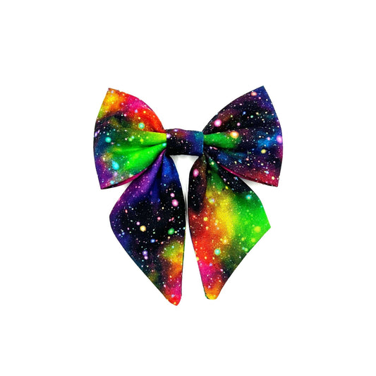 Beautifully made rainbow galaxy print dog sailor bow made to attach to a collar