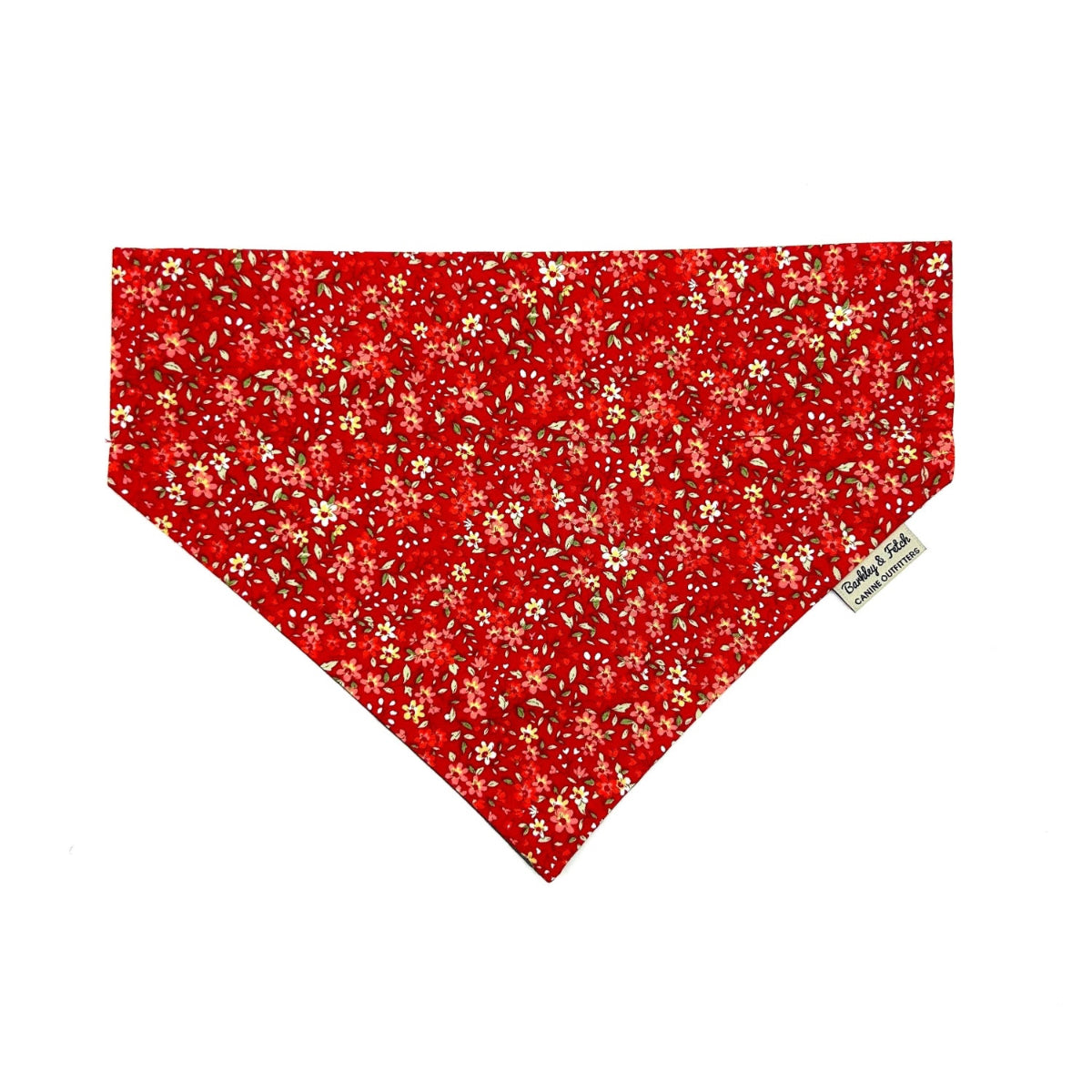 Handmade red ditsy floral print dog bandana that can thread through a collar