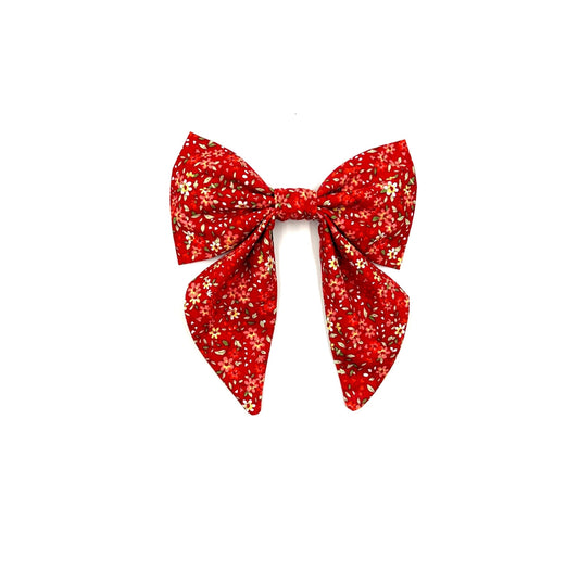 Beautiful handmade red ditsy floral print sailor bow made to attach to a dog collar