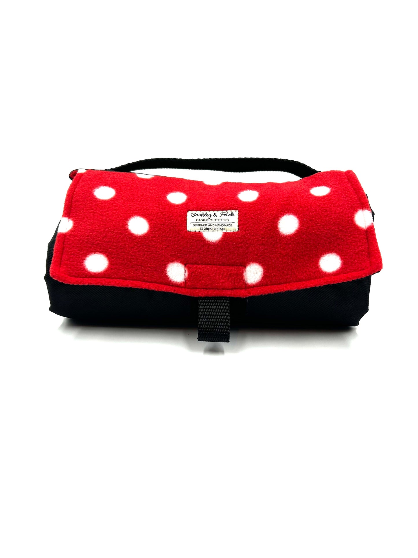 Handmade rolled up settle mat for dogs in red with white spotted fleece fabric