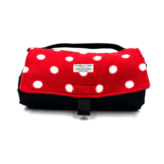 Handmade rolled up settle mat for dogs in red with white spotted fleece fabric British handmade by Barkley and Fetch