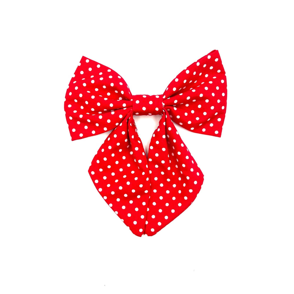 Handmade sailor bow in red fabric with white spots made to attach to a dog collar handmade in uk by barkley and fetch