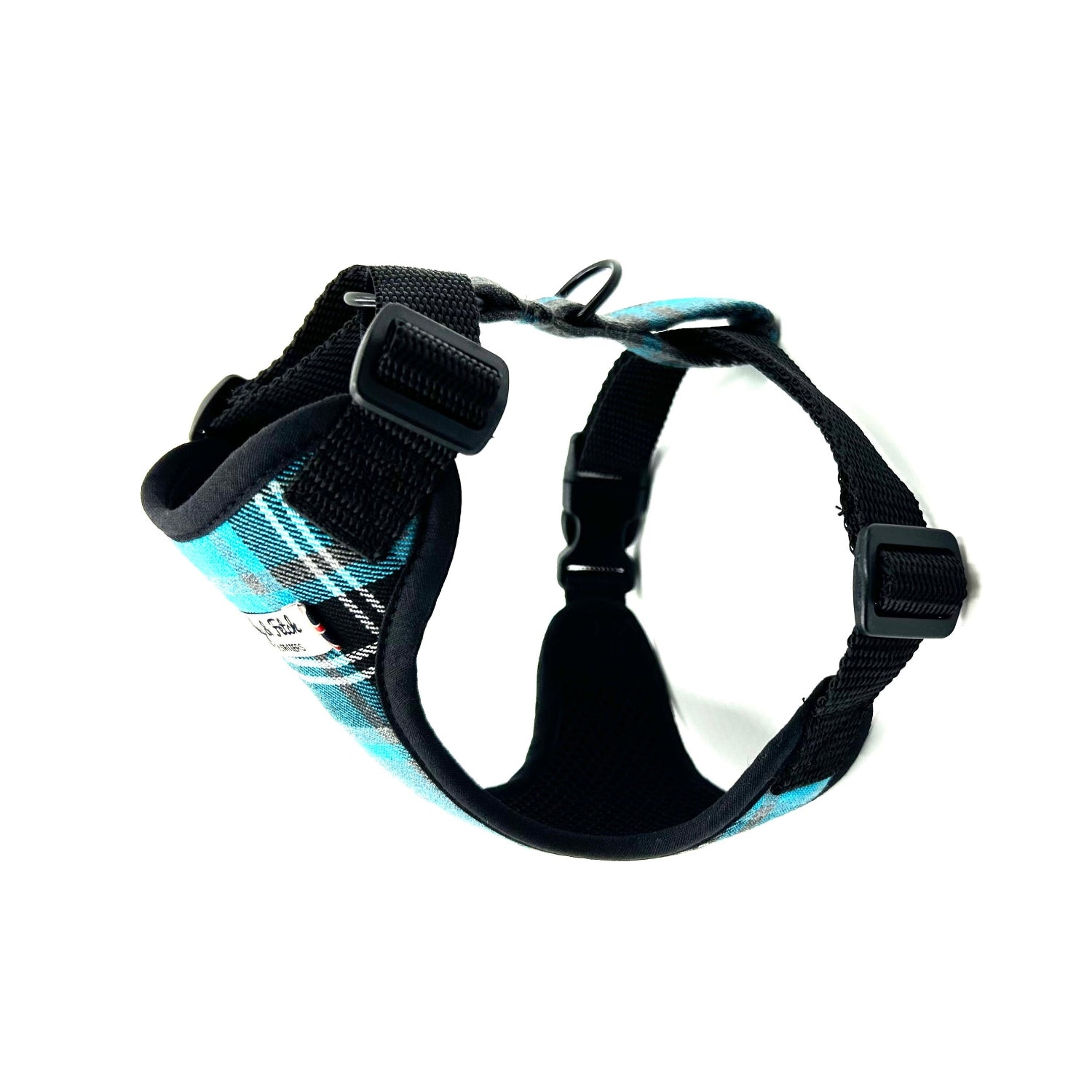 Black dog harness with blue accents on a white background