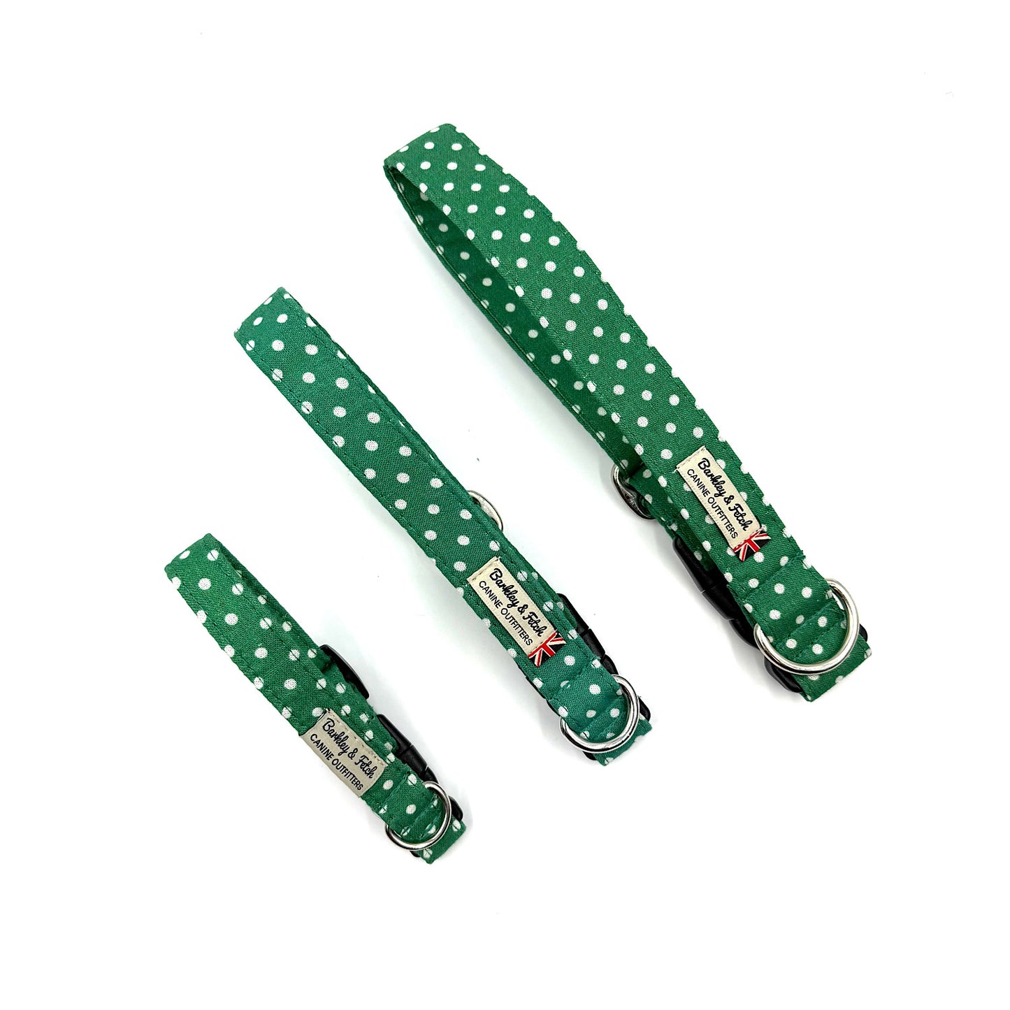 Green polka dot dog collar and leash set on a white background