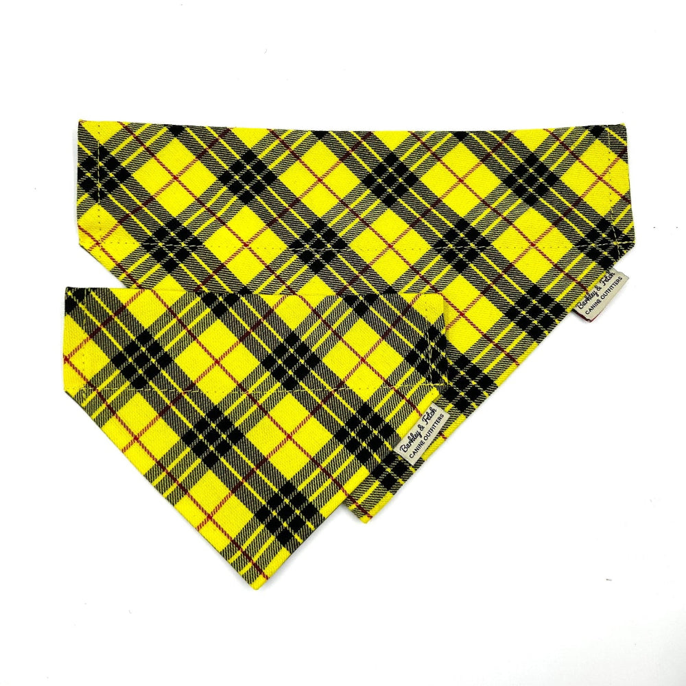 Yellow and black plaid bandana on a white background