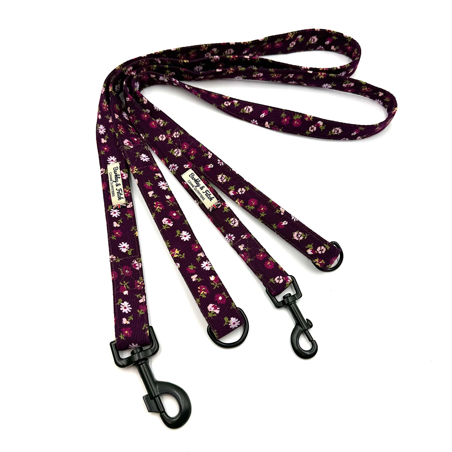 Floral patterned dog leash on a white background