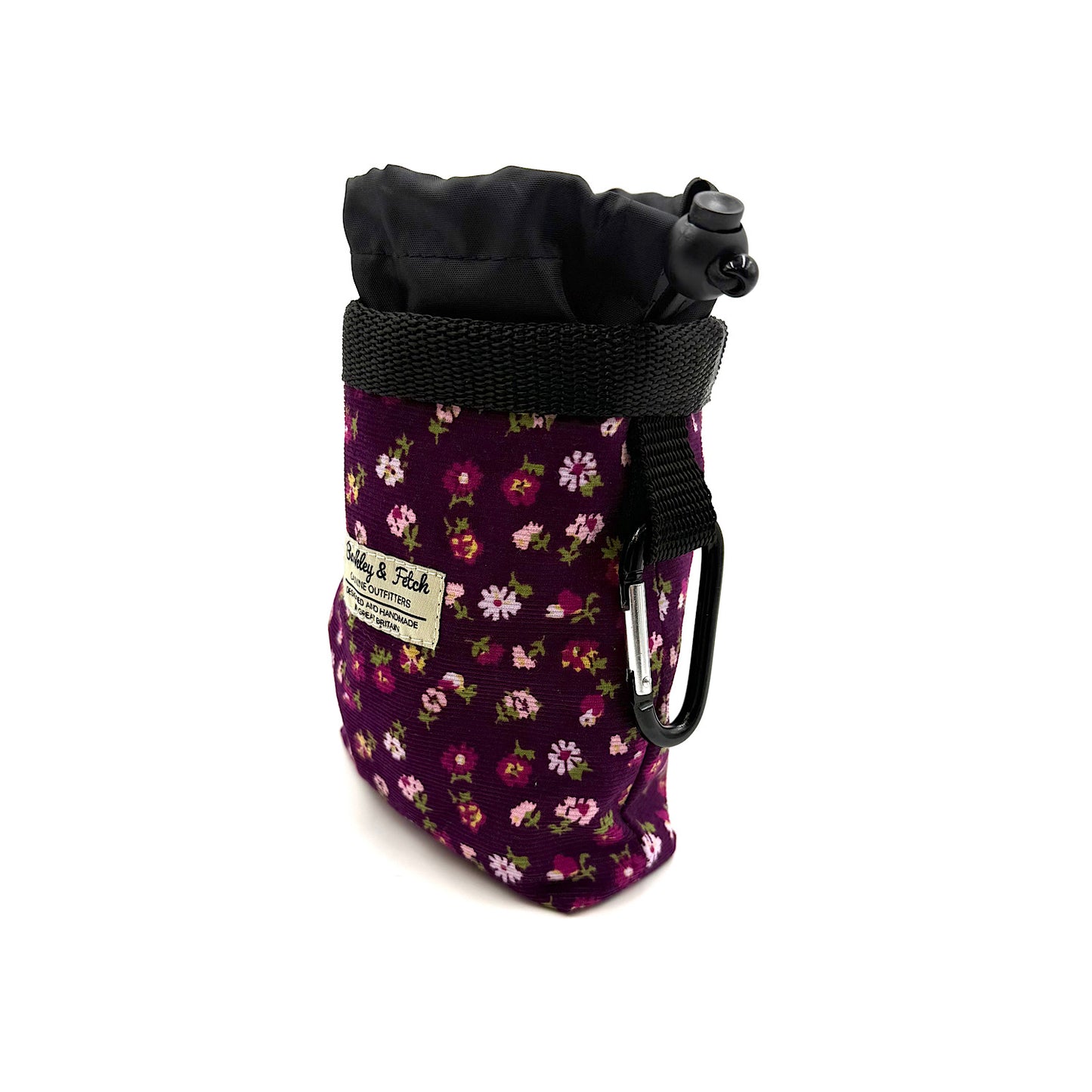 Floral-patterned pouch with black drawstring and carabiner on a white background