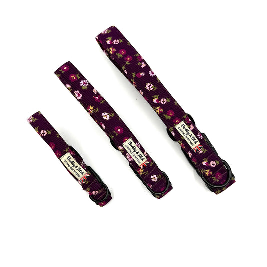 Floral-patterned dog collar and leash set on a white background