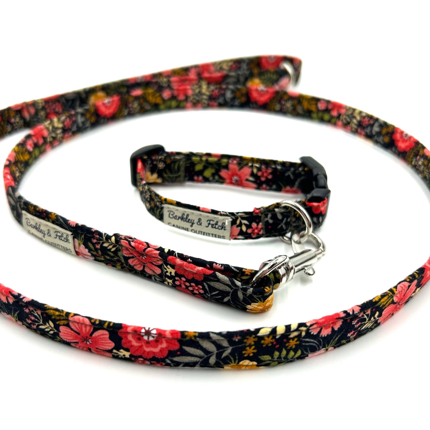 Floral dog collar and leash set on a white background