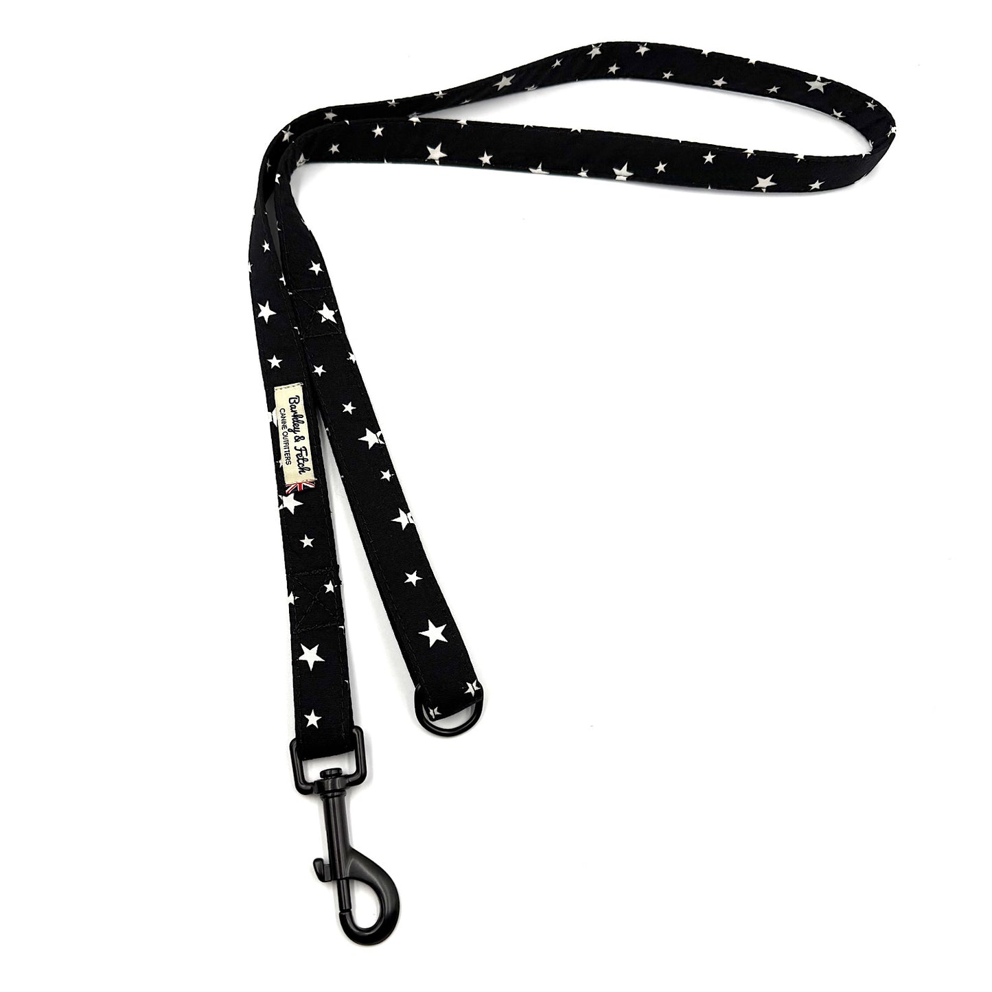 Black dog leash with white star pattern on a white background