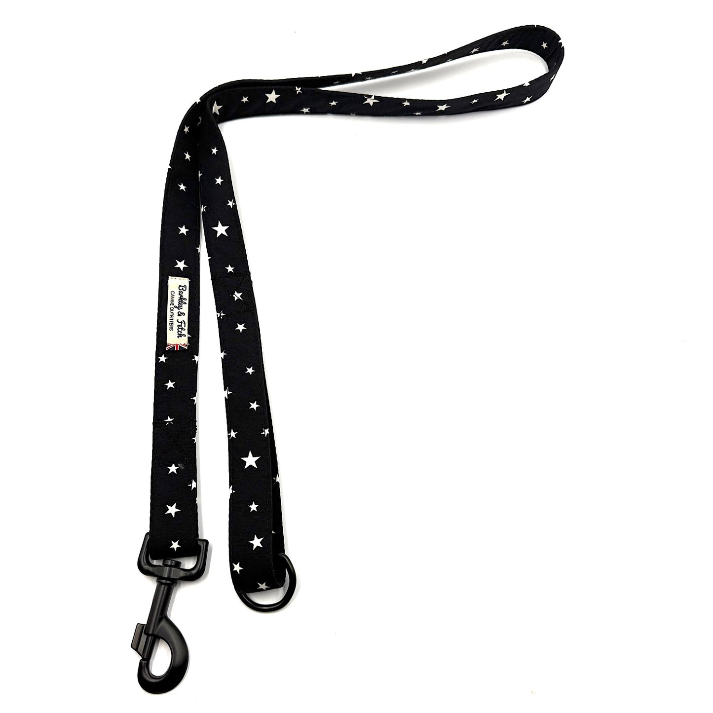 Black dog leash with white star pattern on a white background