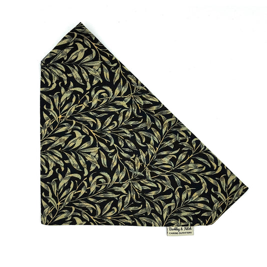 Folded fabric with leaf pattern on a white background