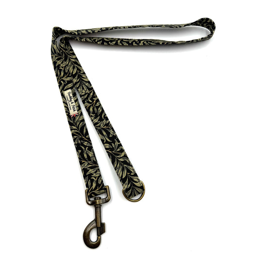 Dog leash with leaf pattern on a white background