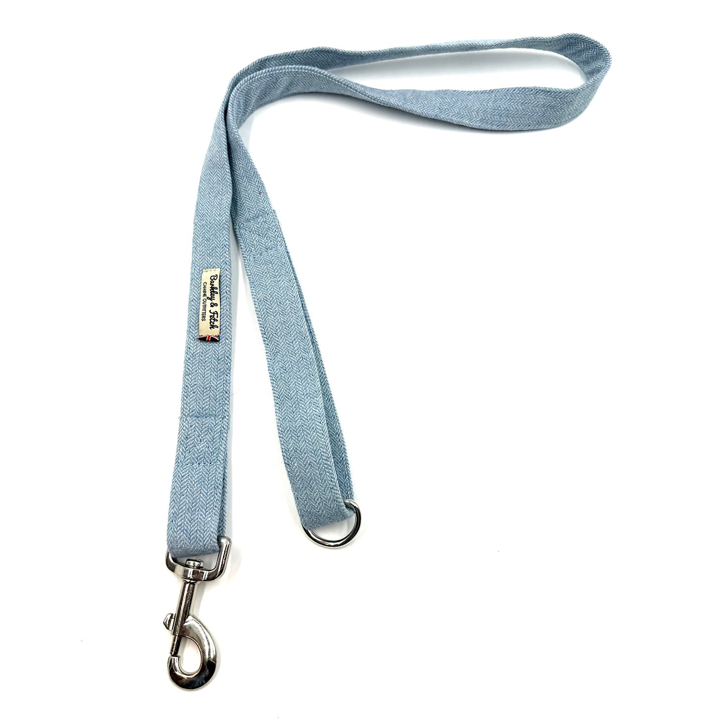 Light blue dog leash with metal clip on a white background