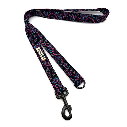 Decorative dog leash with paisley pattern on a white background