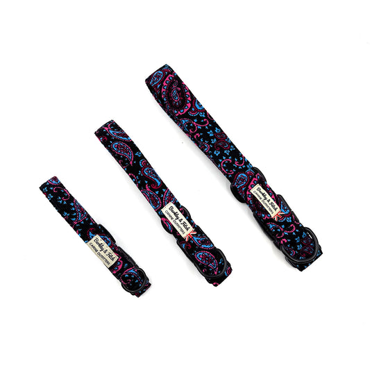 Three patterned dog collars on a white background