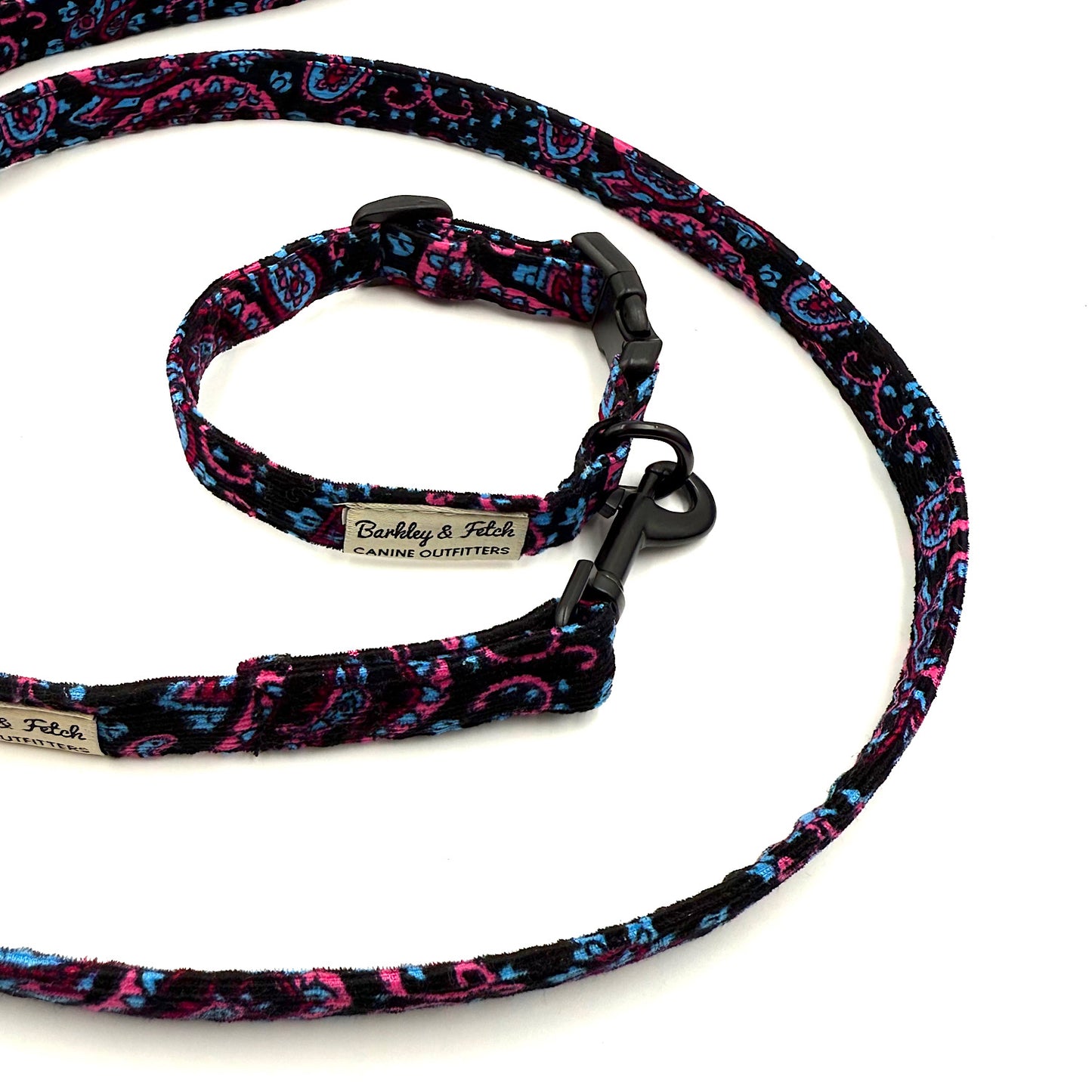 Dog collar and leash set with colorful paisley pattern on a white background