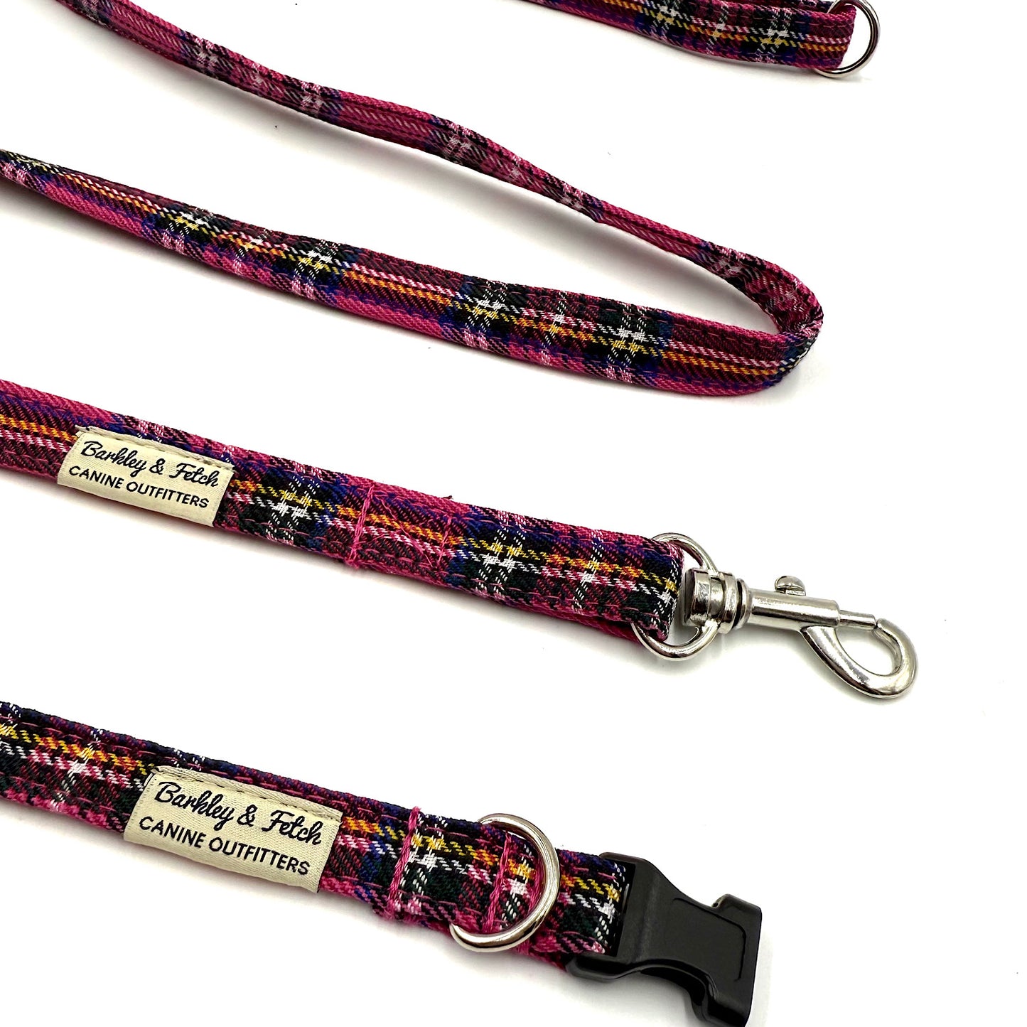 Plaid dog leash with metal clip and 'Barkley & Fetch' label on a white background