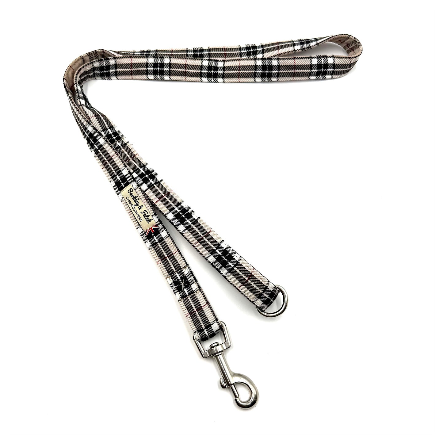 Plaid dog leash with metal clip on a white background