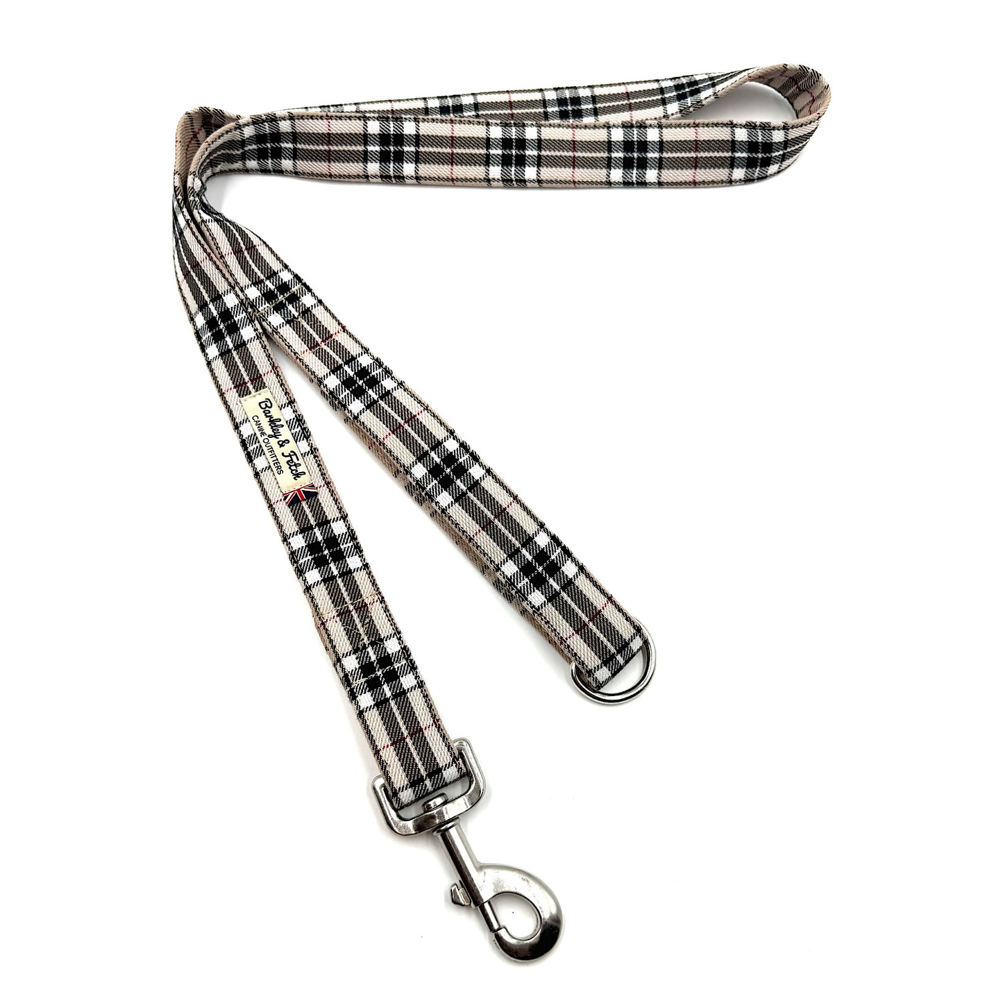 Plaid patterned dog leash on a white background