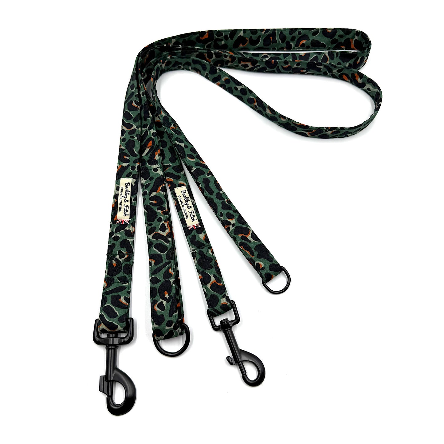 Dog leash with green and black pattern on a white background