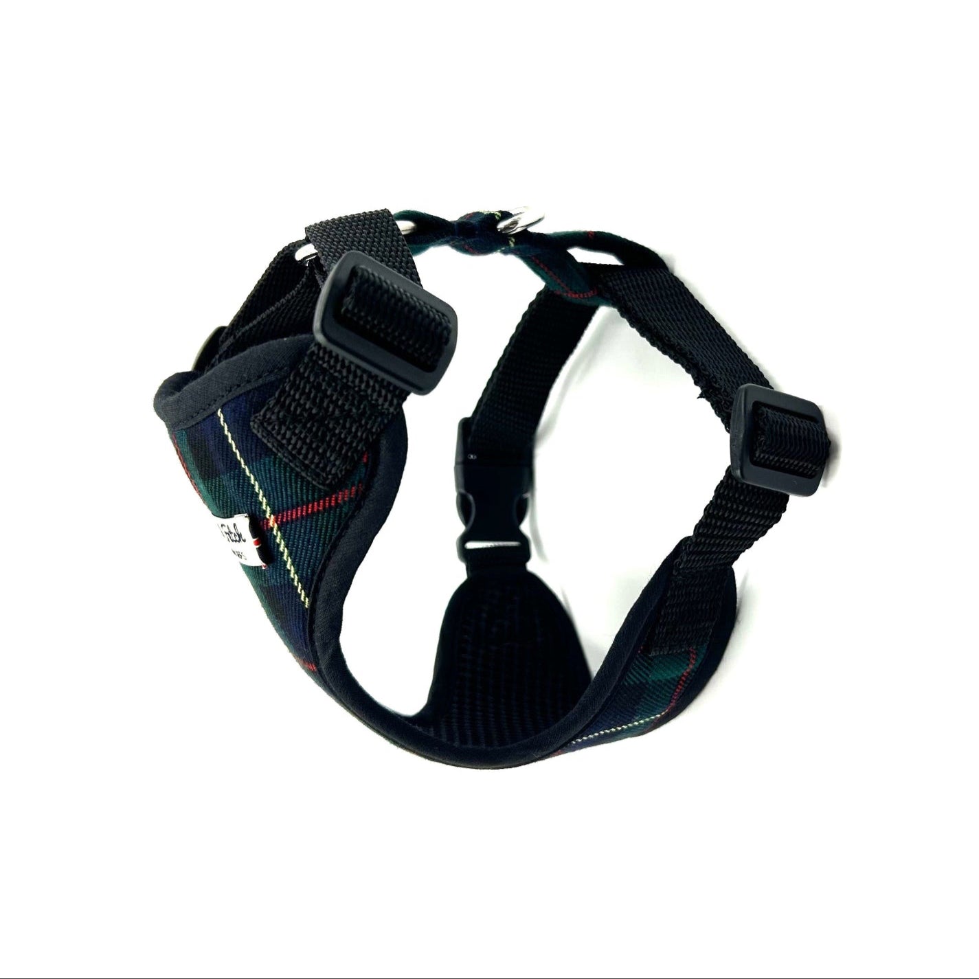 Black dog harness with plaid pattern on a white background