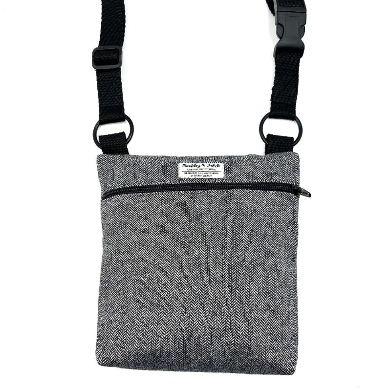 Grey crossbody bag with a visible brand label on a white background Handmade in the UK by Barkley and Fetch