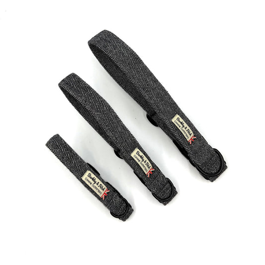 Three grey collar straps with visible branding on a white background handmade by barkley and fetch uk