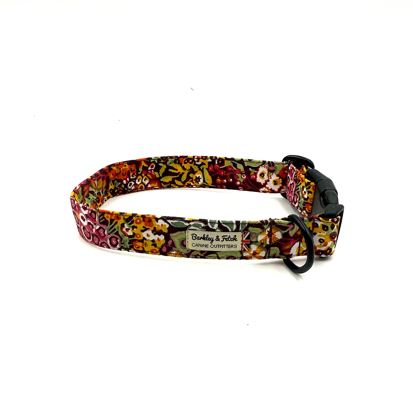 Floral patterned dog collar with a brand label on a white background