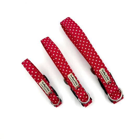 Three red polka dot dog collars with matching tags on a white background handmade by barkley and fetch uk