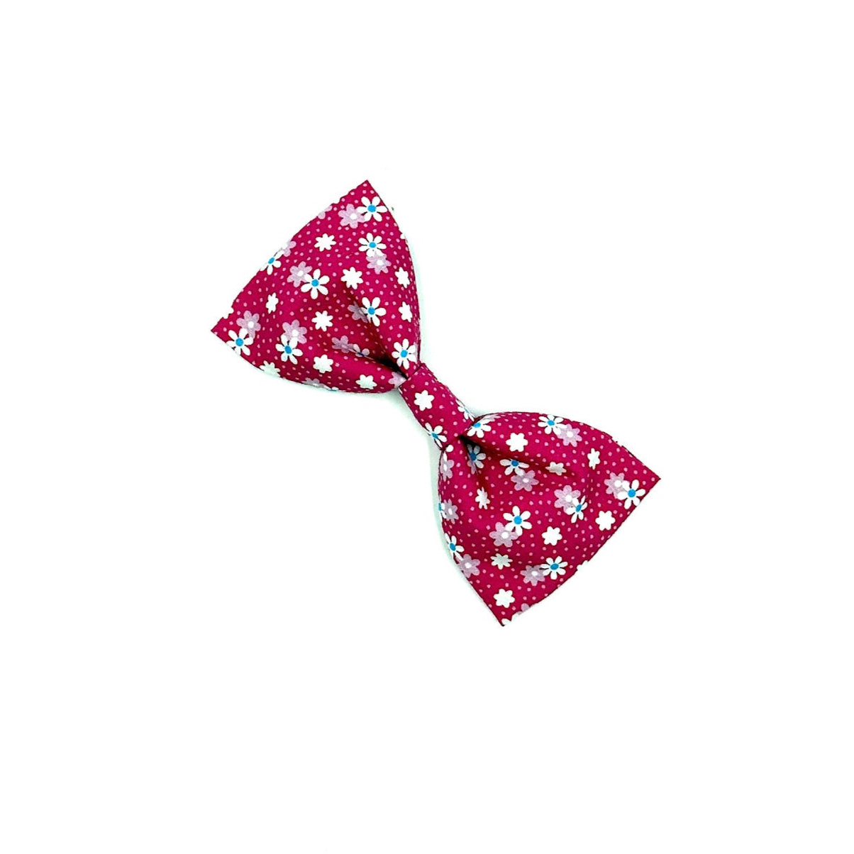 Pink dog bow with white floral pattern on a white background