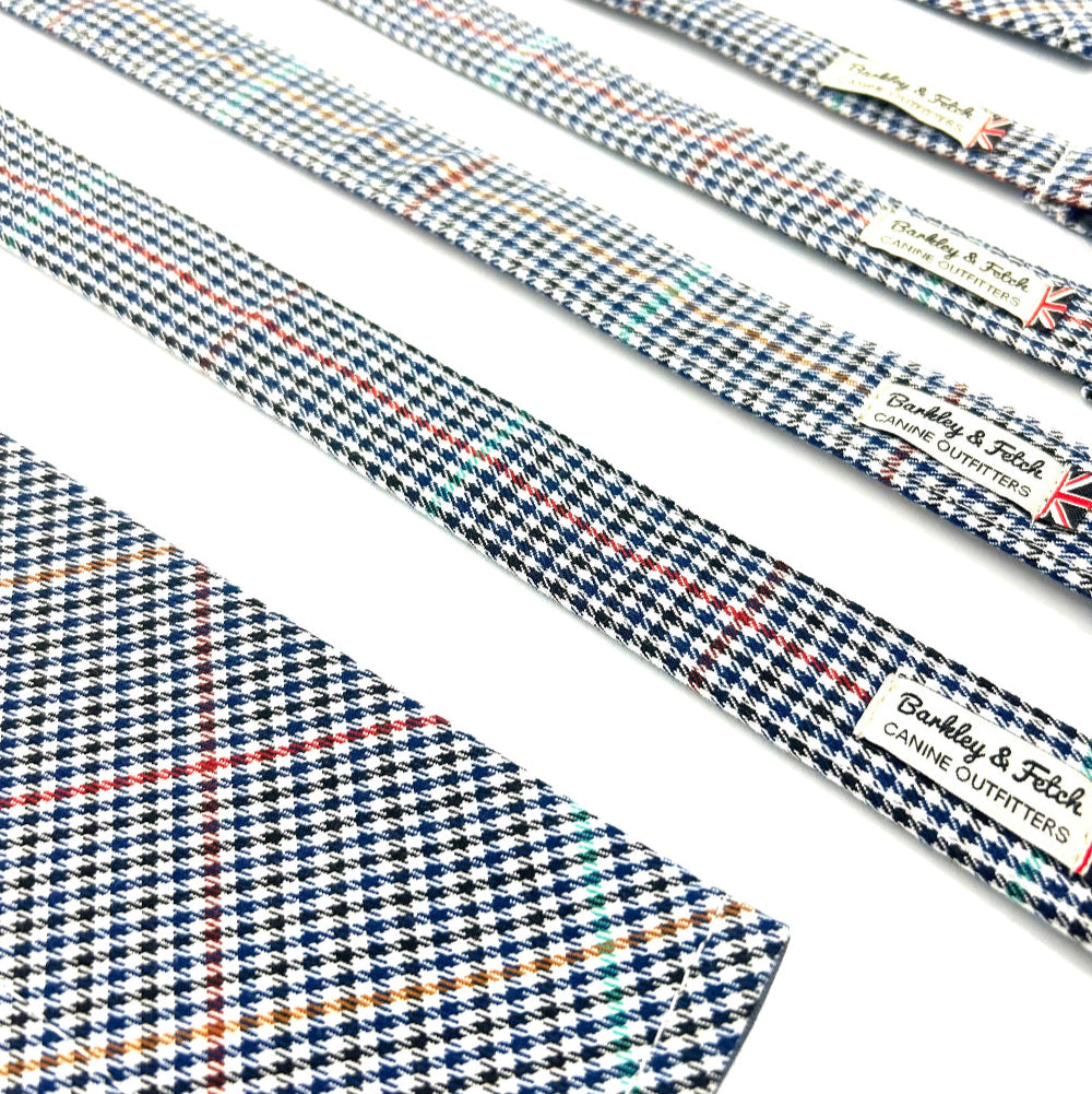 Set of patterned ties with a visible brand label on a white background