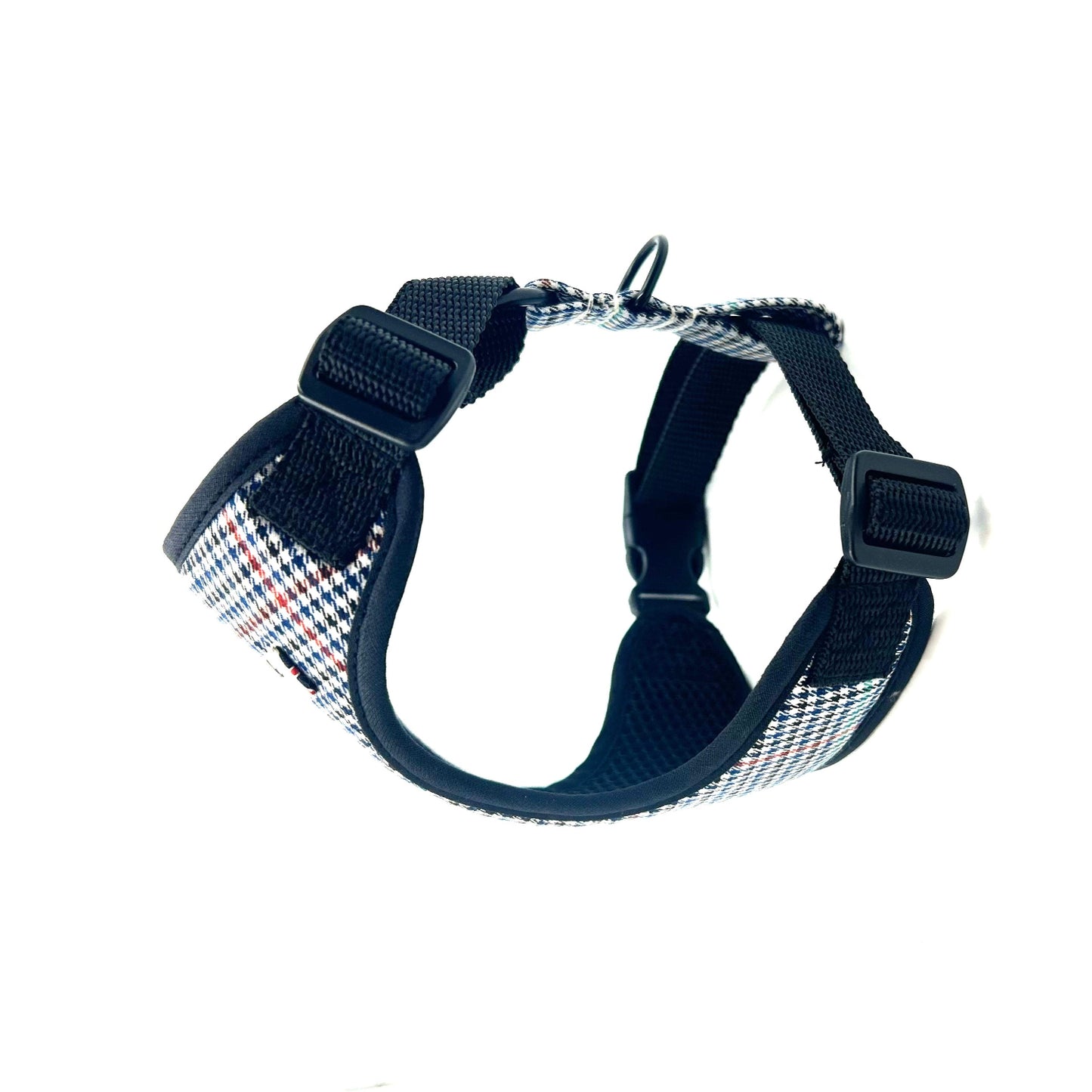 Navy blue dog harness with plaid pattern on a white background