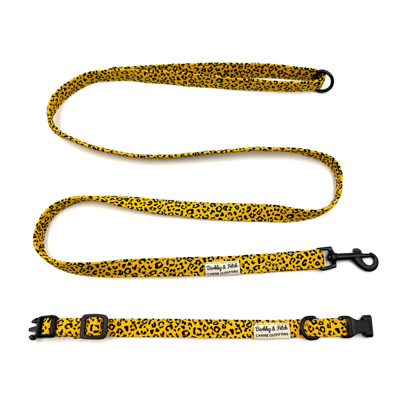 Yellow and black leopard print dog leash with a branded tag on a white background
