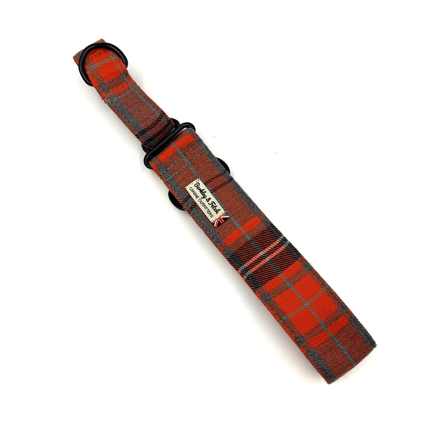Plaid dog collar with visible brand name on a white background