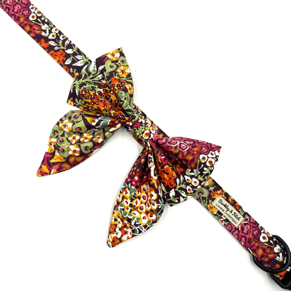 Colorful patterned dog collar with bow on a white background handmade by barkley and fetch uk