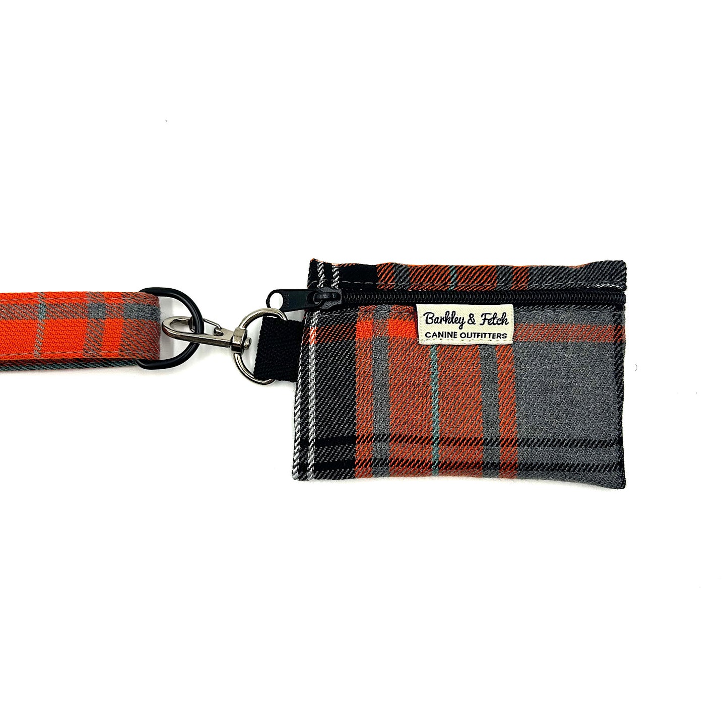 Plaid dog leash with matching pouch on a white background