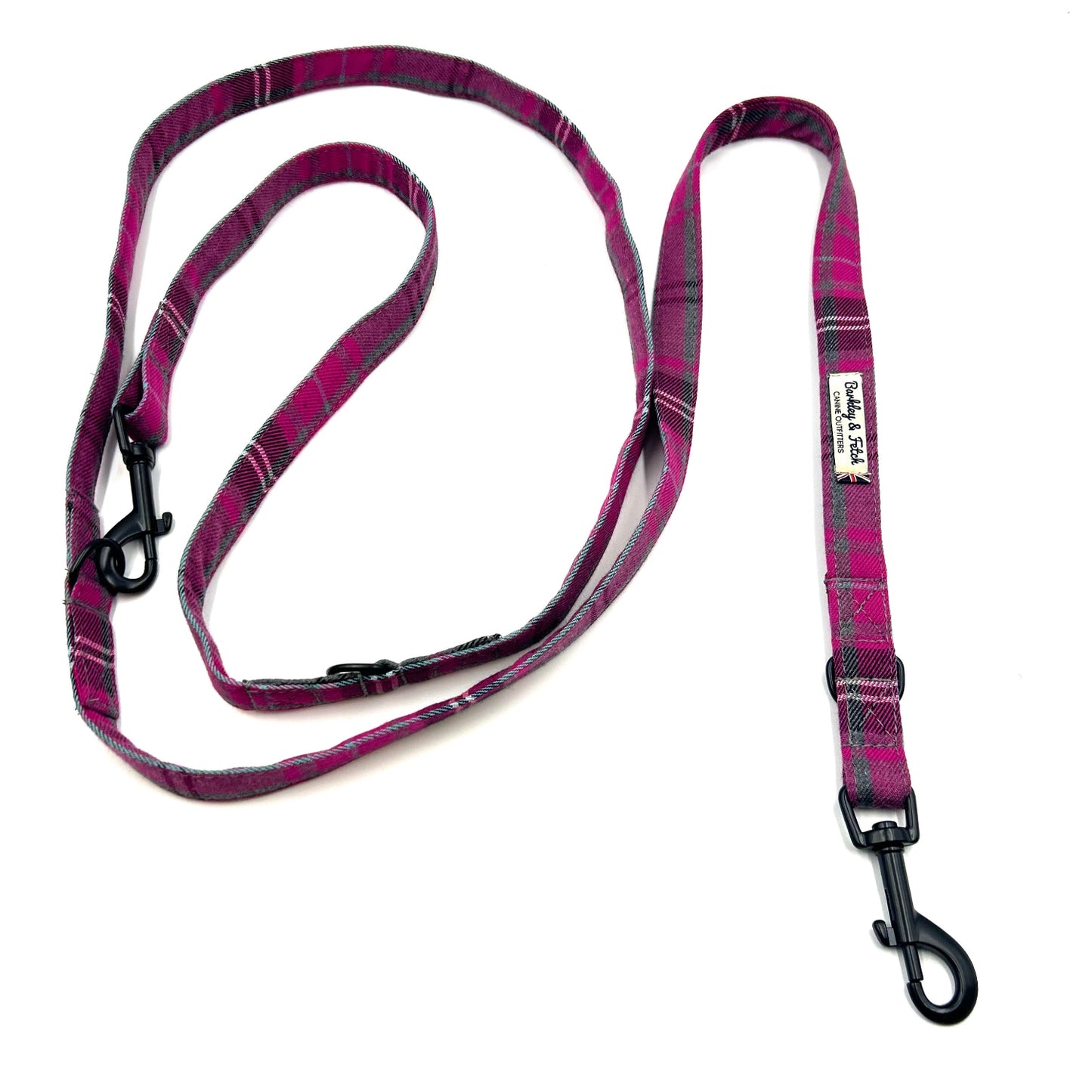 Purple plaid dog leash on a white background