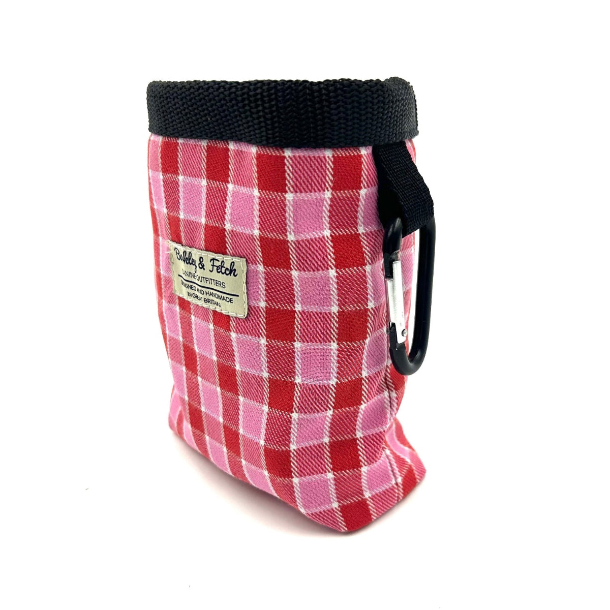 Red and pink checkered pouch with black strap on a white background