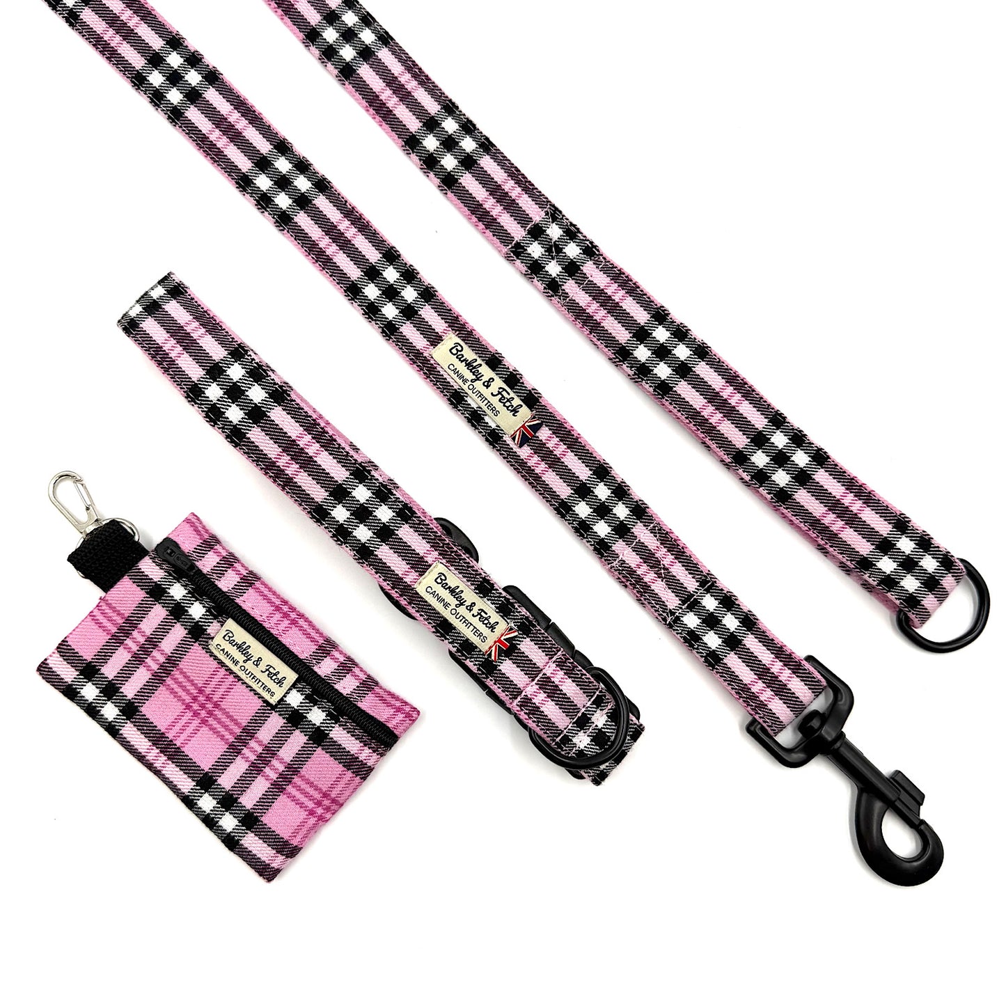 Pink and black plaid dog leash and matching pouch on a white background